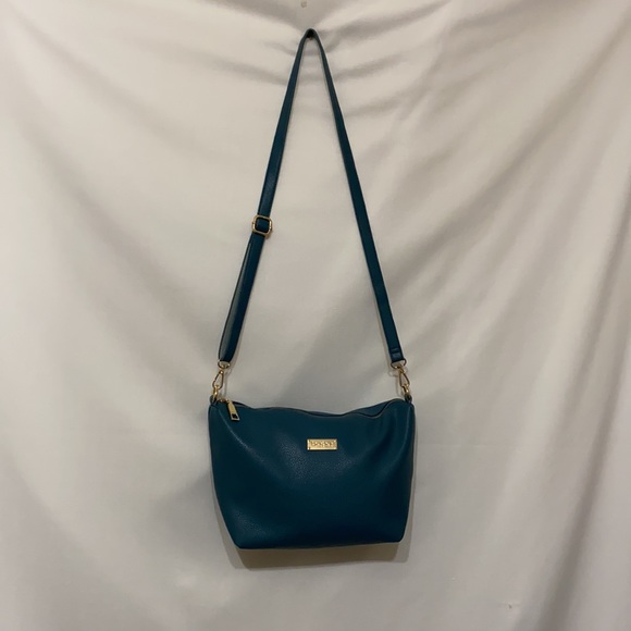 Bebe Los Angeles teal purse. Measures 14”x9”x4” with a 48” long and adjustable - Picture 2 of 6